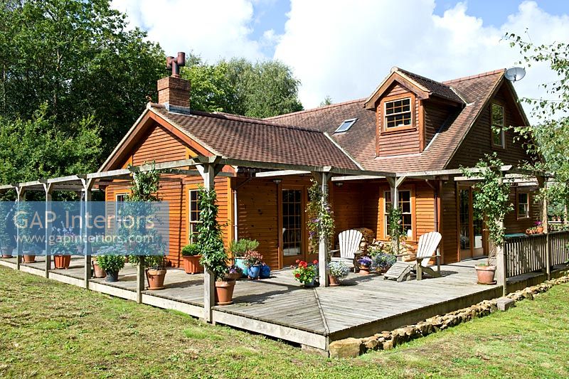 Maison en bois avec terrasse