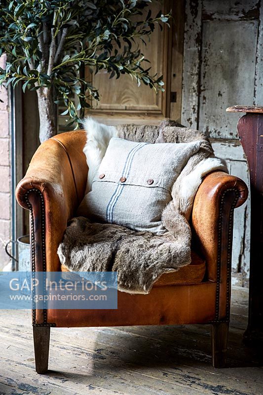 Détail de fauteuil en cuir vintage