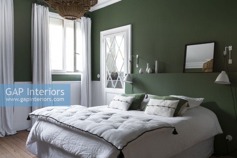 Modern green and white bedroom
