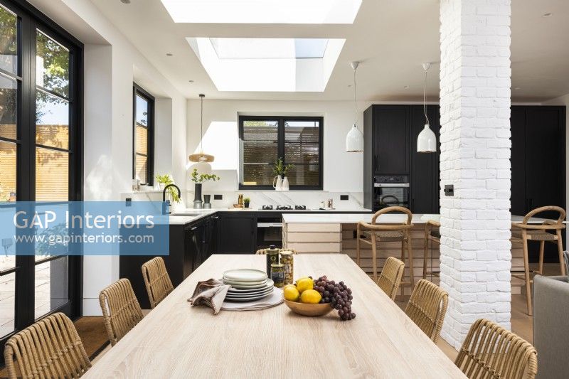 Classic modern kitchen with dining table.