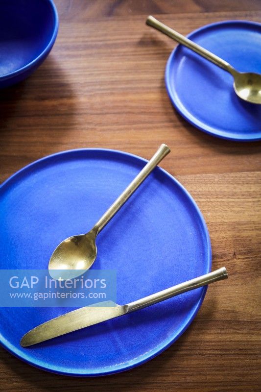 Yves Klein Blue crockery with gold cutlery