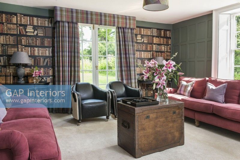 Classic style living room with bookcase wallpaper