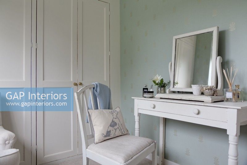 White and duck egg blue bedroom with dressing table
