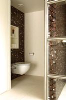 Grande salle de bain contemporaine avec cabine de douche