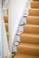 Chaussons décoratifs sur escalier, détail