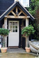 Porte d'entrée et porche en bois