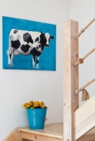Peinture de vache dans les escaliers