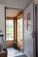 Porte d'entrée et porche en bois