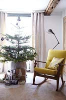 Chaise à bascule par arbre de Noël