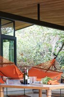 Terrasse couverte avec hamac