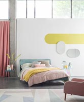 Chambre moderne aux couleurs pastel