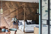 Chambre moderne avec mur en bois