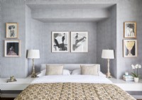 Œuvres d'art encadrées sur les murs gris d'une chambre moderne